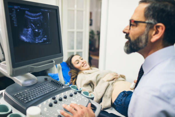 istock Ultrasound Examination In Doctors Office 941338734