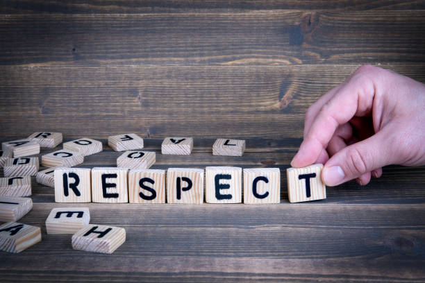 istock Respect. Wooden letters on the office desk 941346870
