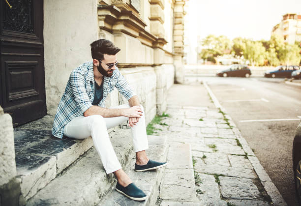 istock Stylish Man Looking at Watch 941351760