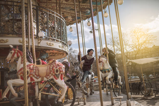 istock Best friends having fun on Carousel 941352024