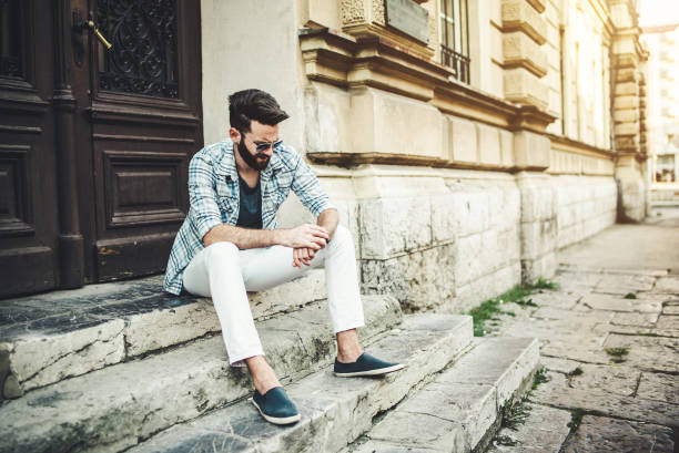 istock Stylish Man Looking at Watch 941352028