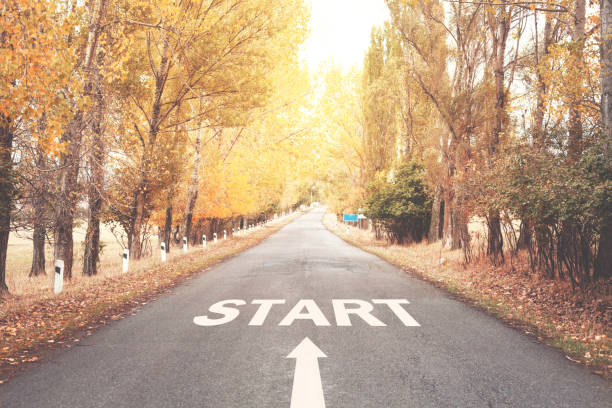 istock Start word on the asphalt road. 941359402