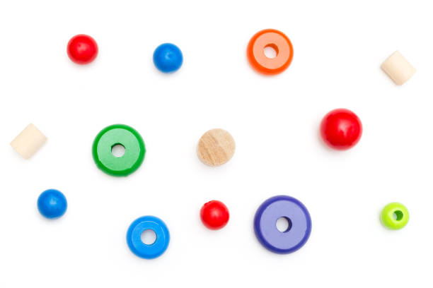 istock Wooden bright toys on a white background. Developing toys 941360002