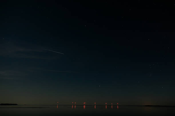 istock Wind turbines in the sea 941364532