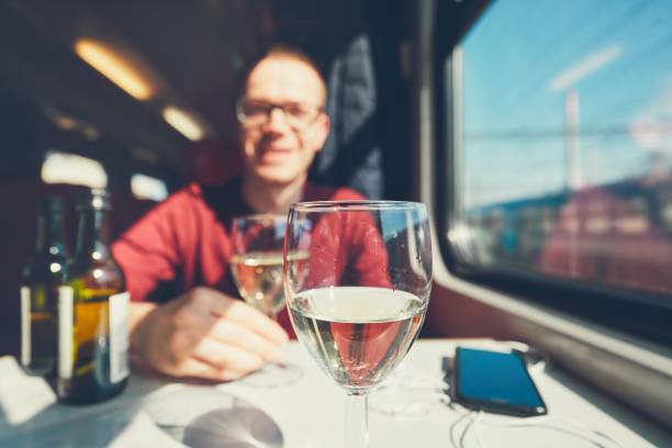 istock Young man traveling by train 941364742