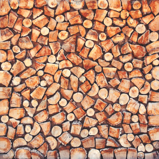 istock Wooden natural sawn a logs closeup, texture background top view 941365016