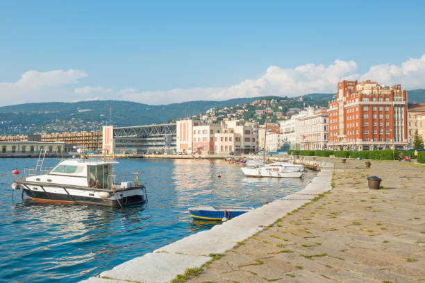 istock Sea harbor with boats near seafront 941368712