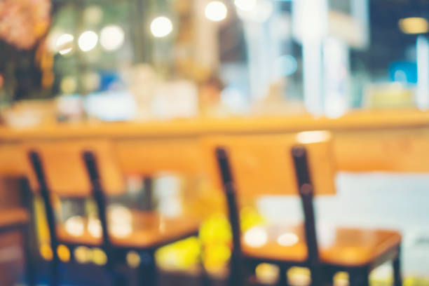 istock Abstract blur defocused restaurant and coffee shop interior for background - Vintage Filter 941369988