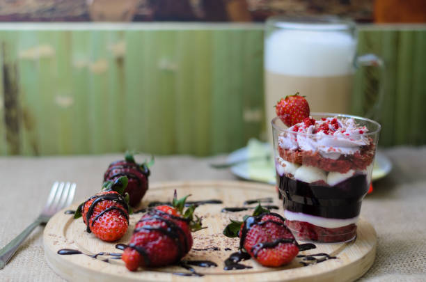 istock Dessert trifle with blueberry cream and strawberries 941373474
