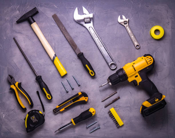 istock a set of yellow instruments on a gray background 941377238