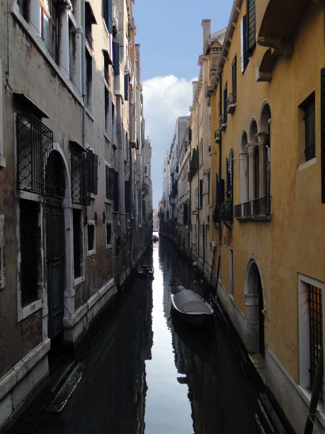 istock Narrow canal in Venice 941387688