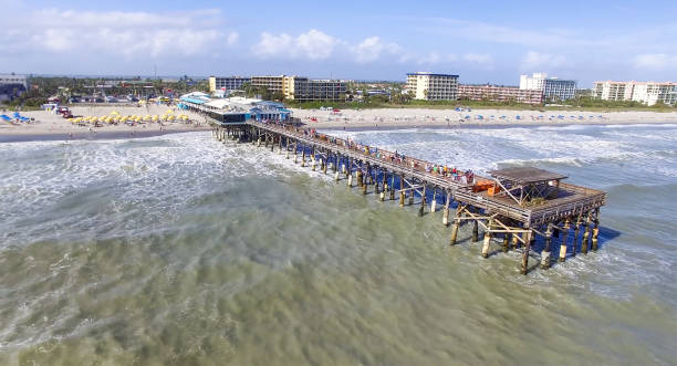 istock Cocoa beach pier aerial view 941391036