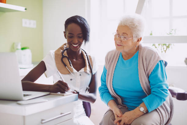 istock Doctor consulting her patient 941396700