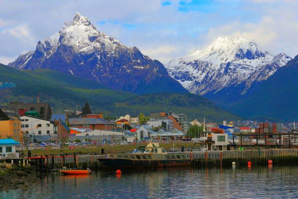 Ushuaia harbor Cityscape in Beagle Channel bay - Tierra Del fuego, Argentina Ushuaia harbor Cityscape in Beagle Channel bay of water - Tierra Del fuego, Argentina – South America beagle channel stock pictures, royalty-free photos & images