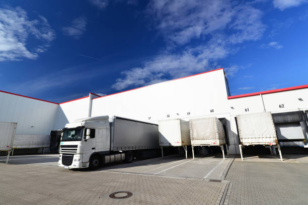 istock loading of lorries at the warehouse of a freight forwarding company 941400308