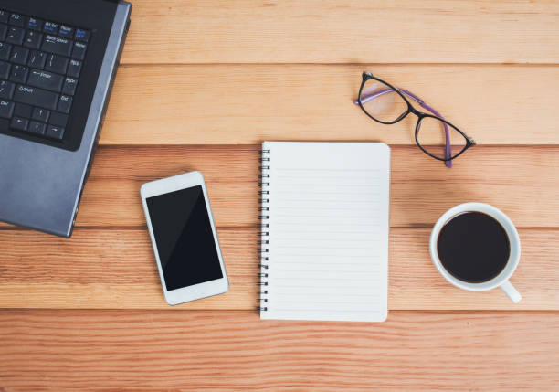 istock Top view of office desk table. 941403436