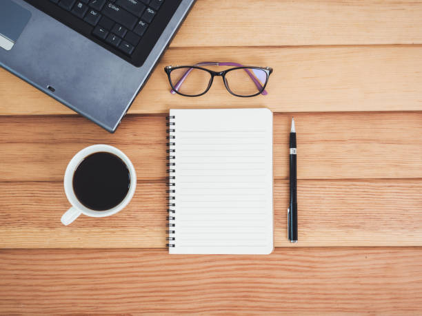 istock Top view of office desk table. 941403450