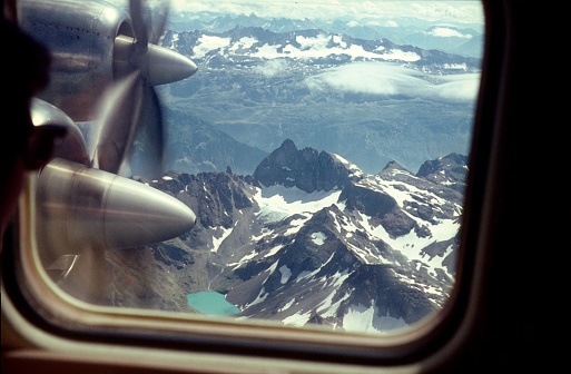 Switzerland, 1967. With a propeller plane over the Alps.