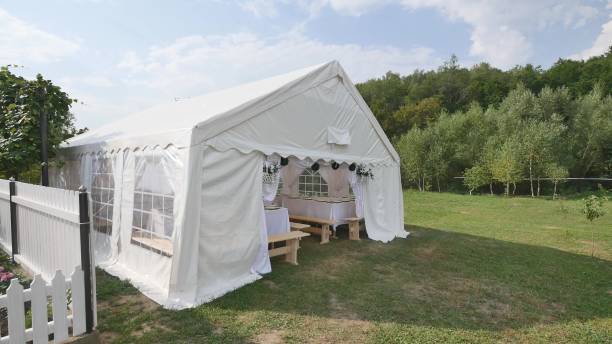 istock Beautiful Banquet hall under a tent for a wedding reception 941407038