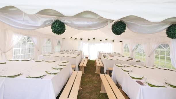 istock Beautiful Banquet hall under a tent for a wedding reception 941407082
