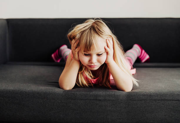 istock sad child, stress and depression 941408098