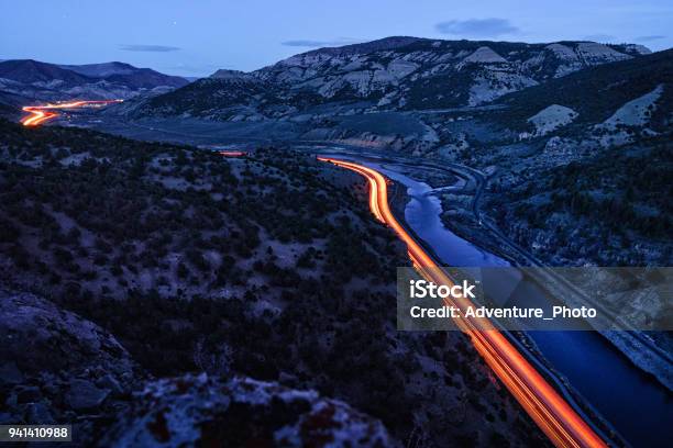 Glenwood Canyon I70 Curves At Night Dusk View Stock Photo - Download Image Now - Colorado, Night, Footpath