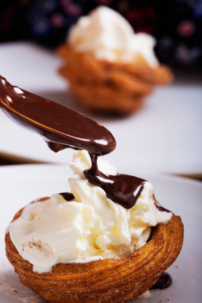 istock Churros basket with ice cream 941419434