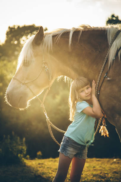 istock Boho Girl with her horse 941420884