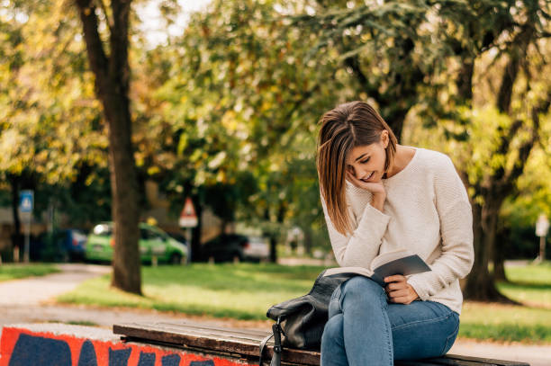 istock A shot of a college student reading a book. 941424788