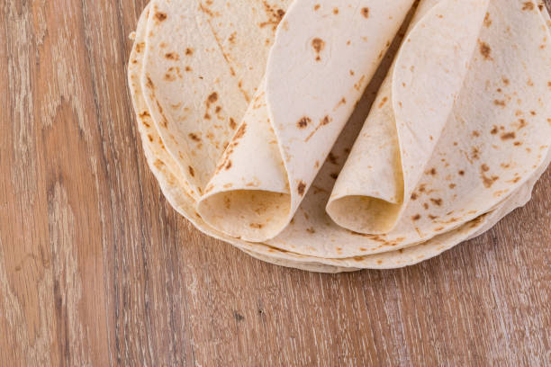 istock tortilla on wooden table 941429378