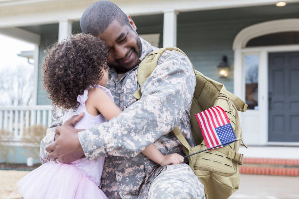 istock Military dad is happy to see young daughter 941439838
