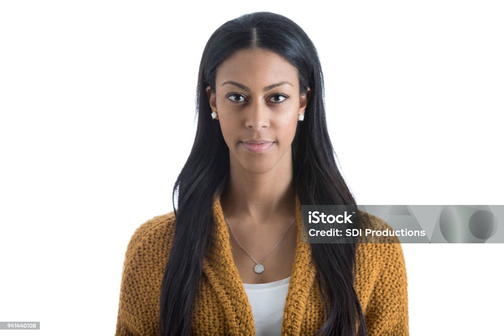 Serious African American woman Portrait of young African American woman with serious expression. Women Stock Photo