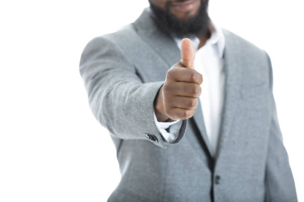 istock Businessman giving thumbs up 941440124