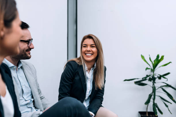 istock Close-up image of three business people having fun during the break. 941440350