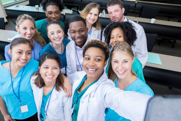 istock Group of medical students take selfie in classroom 941440518