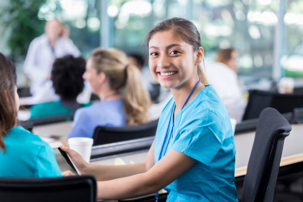istock Young female medical student smiles for camera 941440520