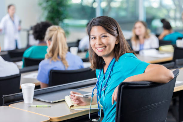 istock Female medical student smiles in class 941440564