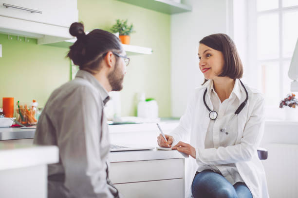istock Doctor consulting her patient 941440636