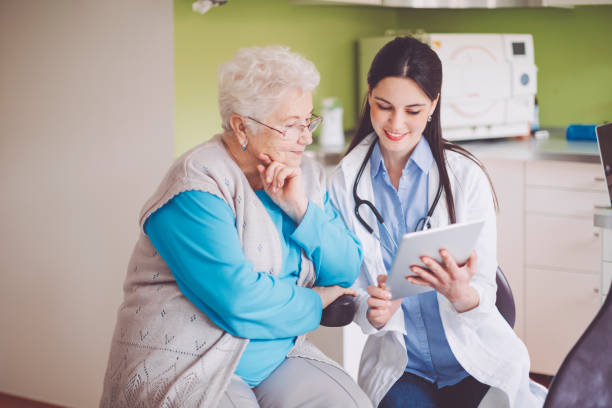 istock Doctor consulting her patient 941442782