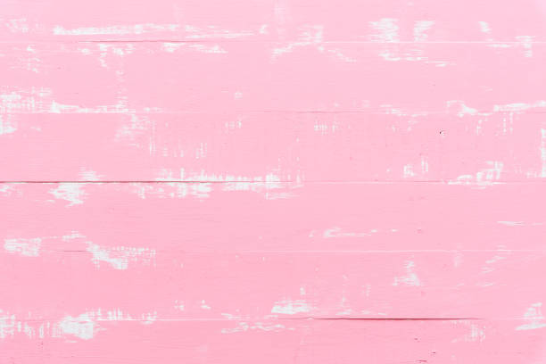 istock Pastel white and pink wooden table background texture. 941443600