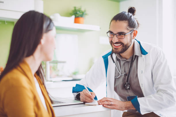 istock Doctor consulting his patient 941443632