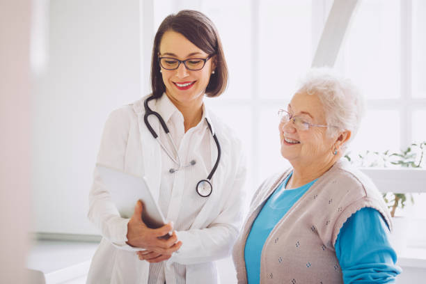 istock Doctor consulting her patient 941443892