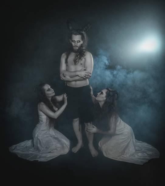 istock Two terrible ghost and demon with horns on dark 941446168