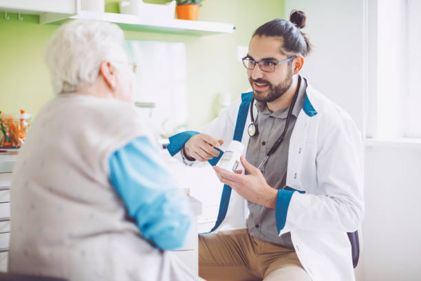 istock Doctor consulting his patient 941446306