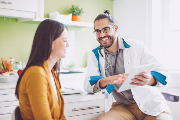 istock Doctor consulting his patient 941446362