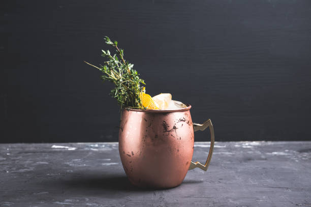 istock Cold orange Moscow mule cocktail in copper mug 941446410