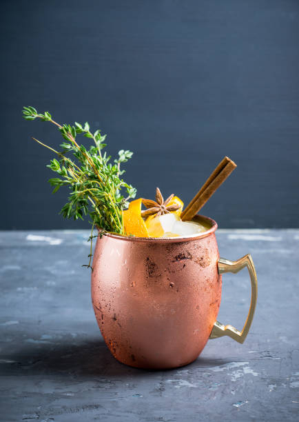 istock Cold orange Moscow mule cocktail in copper mug 941446458