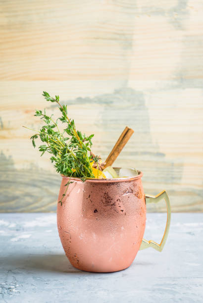 istock Cold orange Moscow mule cocktail in copper mug 941446482