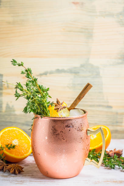istock Cold orange Moscow mule cocktail in copper mug 941446488