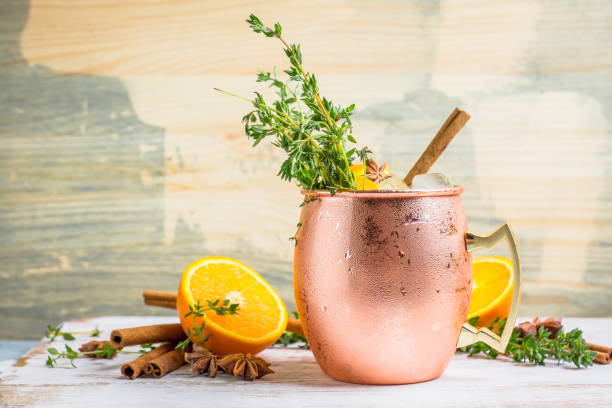 istock Cold orange Moscow mule cocktail in copper mug 941446492